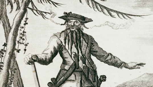 Detail from an illustration of the pirate Edward 'Blackbeard' Teach. Image: Royal Museums Greenwich Image:Detail from an illustration of the pirate Edward 'Blackbeard' Teach. Image: Royal Museums Greenwich