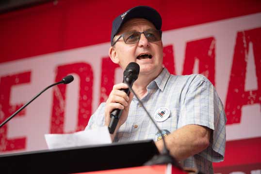 General secretary Mark Dickinson speaking on behalf of maritime workers at the We Demand Better March and Rally, which was attended by an estimated 30,000 people. Image: Anna Gordon Image:General secretary Mark Dickinson speaking on behalf of maritime workers at the We Demand Better March and Rally, which was attended by an estimated 30,000 people. Image: Anna Gordon