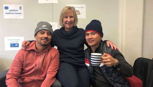 Image:BEM recipient Janet Webber (middle) with seafarers at the New Zealand Port of Lyttelton Seafarers' Centre pre-Covid. Image: The Mission to Seafarers