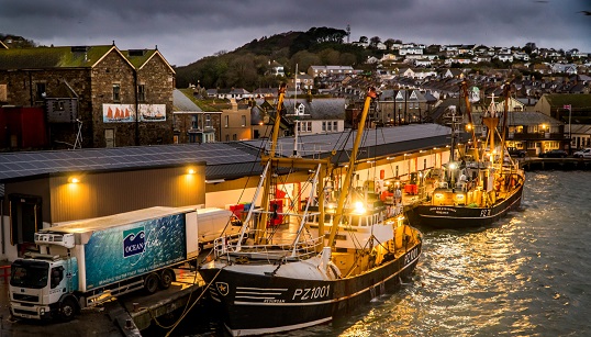The winning picture, 'Beam trawlers landing to the fish market at night'. Image: Laurence Hartwell. Image:The winning picture, 'Beam trawlers landing to the fish market at night'. Image: Laurence Hartwell.