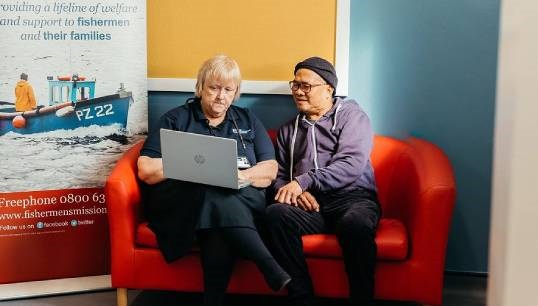 Image:Dedicated ambassador: one of this year’s recipients of the MNWB's annual Award for Service to Seafarers' Welfare Paula Daly (left) with a visiting seafarer. She has oversight for 246 clients.  Image: MNWB