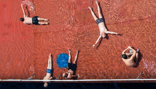 'Blowing off steam': seafarers on a flooded deck by chief engineer and photographer Popescu Cezar Gabriel. Image: By permission of artist © Popescu Cezar Gabriel. Image:'Blowing off steam': seafarers on a flooded deck by chief engineer and photographer Popescu Cezar Gabriel. Image: By permission of artist © Popescu Cezar Gabriel.