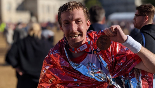 George Belcher after crossing the finishing line and receiving his medal of recognition for taking part in the London Marathon 2021. Image:George Belcher after crossing the finishing line and receiving his medal of recognition for taking part in the London Marathon 2021.