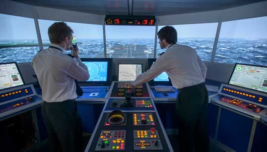 Image:Students operate equipment in a ship's bridge simulation room. Image: Monty Rakusen/Getty Images