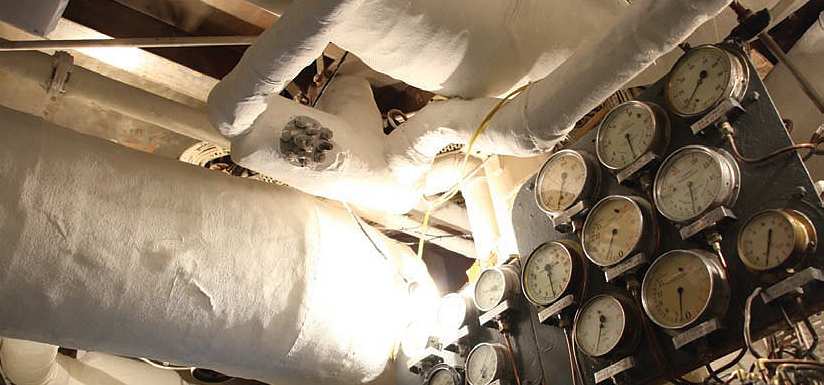 Image:Many seafarers were exposed to asbestos which had been used to lag pipes in enginerooms