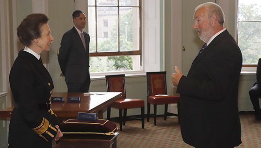 Image:Nautilus member Captain Kevin Vallance talks to HRH The Princess Royal before receiving his Merchant Navy Medal for Meritorious Service at the June 2021 ceremony for the state honour's 2020 awardees. 
Image: Mark Dalton