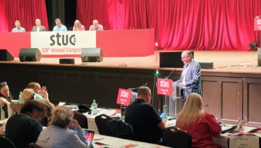 Image:Nautilus head of industrial Micky Smyth proposing the motion. Image: Nautilus International