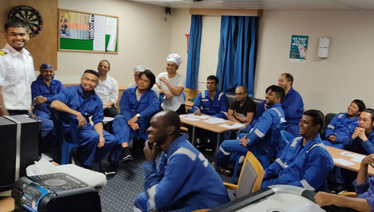 A gathering in the crew recreation room onboard one of the vessels in the SIM project Phase Two trial. All crew are all tested for Covid-19 before joining their contracts. Image: ISWAN Image:A gathering in the crew recreation room onboard one of the vessels in the SIM project Phase Two trial. All crew are all tested for Covid-19 before joining their contracts. Image: ISWAN