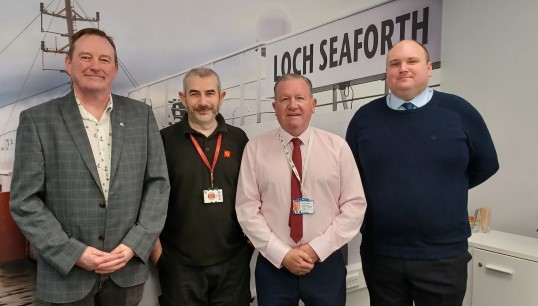 Liaison officers Iain MacKenzie, Allan Dickson and James Christie with Nautilus head of industrial Micky Smyth (second from right) during the negotiations. Image: Nautilus International Image:Liaison officers Iain MacKenzie, Allan Dickson and James Christie with Nautilus head of industrial Micky Smyth (second from right) during the negotiations. Image: Nautilus International