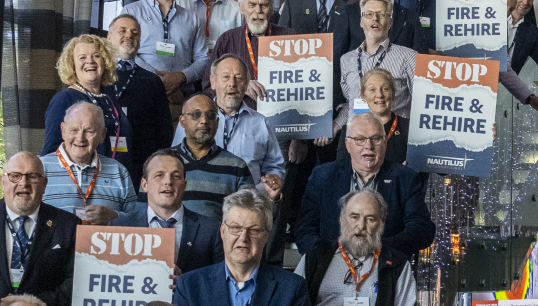 Members at Nautilus's General Meeting showing support for those threatened with fire and rehire. Image: Brad Wakefield Image:Members at Nautilus's General Meeting showing support for those threatened with fire and rehire. Image: Brad Wakefield