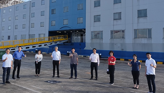 Image:Ms Mary Liew, general secretary of SMOU,  (red polo shirt), and Mr Kam Soon Huat, president of SOS, (light blue long sleeved shirt) with stakeholders at the signing ceremony. Image: Singapore Maritime Officers’ Union.