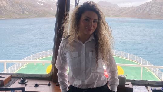 Scarlett Barnett-Smith on the bridge during her time with the British Antarctic Survey. Image: courtesy of Scarlett Barnett-Smith Image:Scarlett Barnett-Smith on the bridge during her time with the British Antarctic Survey. Image: courtesy of Scarlett Barnett-Smith