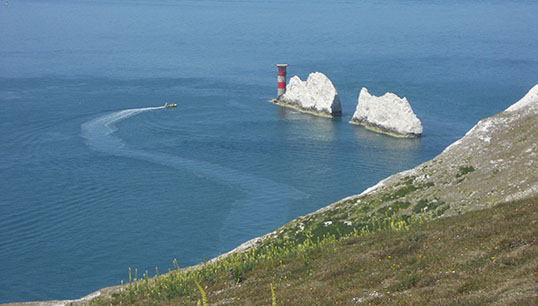 Image:Schoolchildren on the Isle of Wight are taking part in a maritime curriculum pilot which includes studying coastal erosion close to home. Image of The Needles: ITookSomePhotos / Wikimedia Commons
