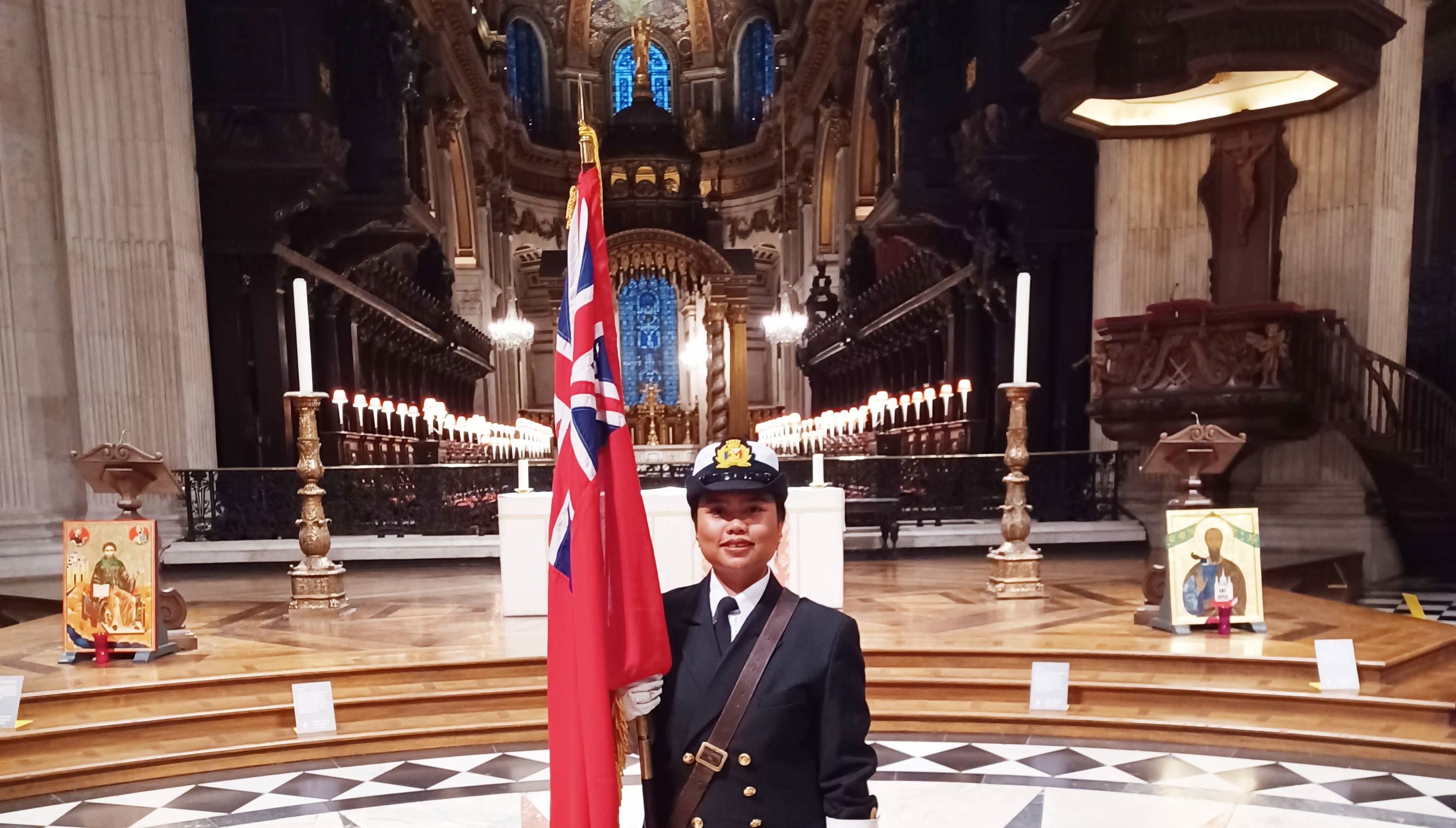 Molvipa Takhiansok, a Nautilus Bevis Minter Award recipient in 2023, carried the Merchant Navy standard at the service. Images: Nautilus International Image:Molvipa Takhiansok, a Nautilus Bevis Minter Award recipient in 2023, carried the Merchant Navy standard at the service. Images: Nautilus International