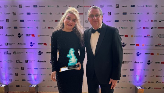2024 Bevis Minter Award winner Scarlett Barnett-Smith accepting her award from Nautilus general secretary Mark Dickinson at the Maritime UK award ceremony in Belfast. Image: Maritime UK Image:2024 Bevis Minter Award winner Scarlett Barnett-Smith accepting her award from Nautilus general secretary Mark Dickinson at the Maritime UK award ceremony in Belfast. Image: Maritime UK
