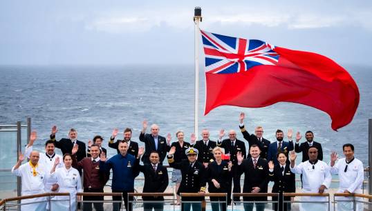 Image:A flag-raising ceremony was held aboard Cunard Line flagship RMS Queen Mary 2. Image: Cunard Line