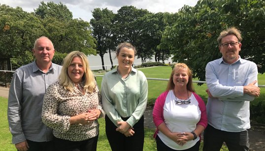 Some of the Nautilus Welfare Fund caseworkers. L to R: Iain Lindsay, Glasgow; Ruth O'Brien, Merseyside; Kayleigh Bricknell, Cardiff and South Wales; Gwen Rayner, Tyne and Wear; John Norris, Hull and Grimsby. There is also a caseworker in Portsmouth. Image:Some of the Nautilus Welfare Fund caseworkers. L to R: Iain Lindsay, Glasgow; Ruth O'Brien, Merseyside; Kayleigh Bricknell, Cardiff and South Wales; Gwen Rayner, Tyne and Wear; John Norris, Hull and Grimsby. There is also a caseworker in Portsmouth.