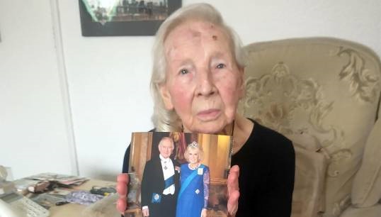 Mrs Peggy Sharrock with the photographic card she received from King Charles and Queen Camilla wishing her 'warmest congratulations and heartfelt good wishes' on her 100th birthday. Images: Nautilus International Image:Mrs Peggy Sharrock with the photographic card she received from King Charles and Queen Camilla wishing her 'warmest congratulations and heartfelt good wishes' on her 100th birthday. Images: Nautilus International